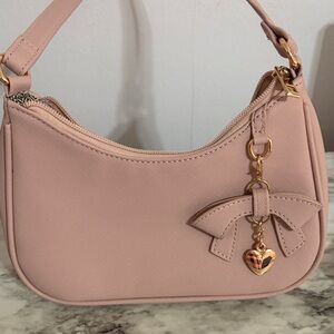 Elegant Pink Handbag with Gold Accents
